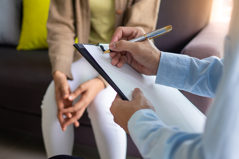 Therapist and Patient Consultation Indoors 